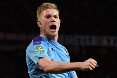 Manchester City's Belgian midfielder Kevin De Bruyne celebrates scoring his team's third goal during the English League Cup semi-final first leg football match between Manchester United and Manchester City at Old Trafford in Manchester, north west England on January 7, 2020. - RESTRICTED TO EDITORIAL USE. No use with unauthorized audio, video, data, fixture lists, club/league logos or 'live' services. Online in-match use limited to 75 images, no video emulation. No use in betting, games or single club/league/player publications. / AFP / Paul ELLIS / RESTRICTED TO EDITORIAL USE. No use with unauthorized audio, video, data, fixture lists, club/league logos or 'live' services. Online in-match use limited to 75 images, no video emulation. No use in betting, games or single club/league/player publications.