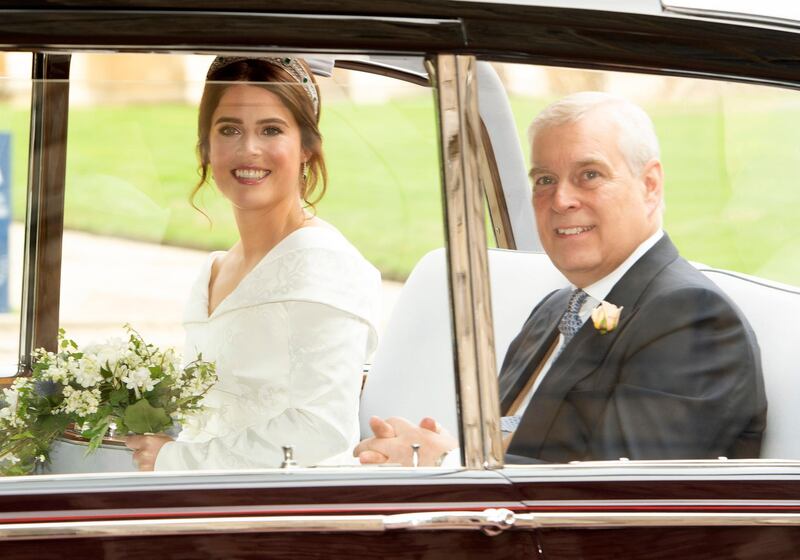 Britain's Princess Eugenie of York  arrives with her father, Prince Andrew, Duke of York for her wedding ceremony. EPA