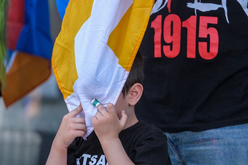 A child in a protest outside the Turkish consulate in Beverly Hills, California, to remember the mass murder, starvation and displacement of 1.5 million Armenians by the Ottoman empire during the First World War.  AFP