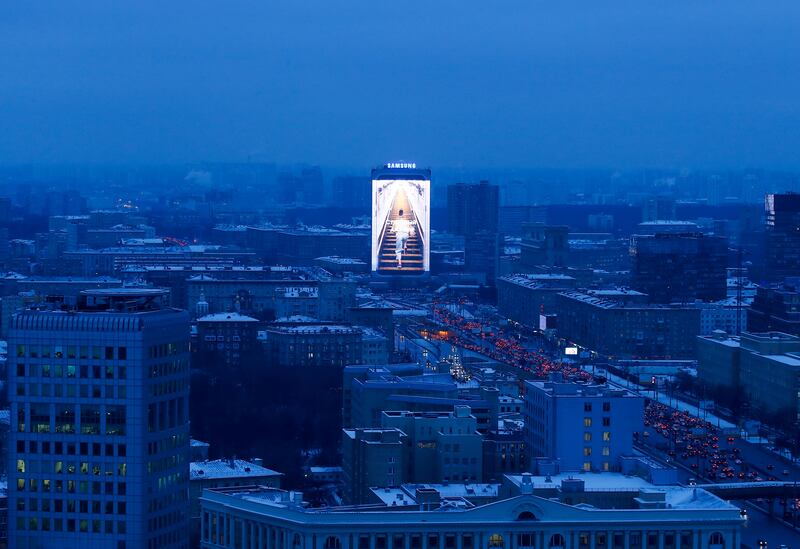 An electronic billboard on RusHydro’s Institute Hydroproject building in Moscow displays a Samsung advert. Reuters