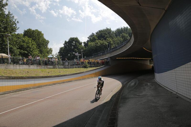 A cyclists trains on the track prior to the first stage of the Tour de France in Utrecht, Netherlands on Saturday. Christophe Ena / AP