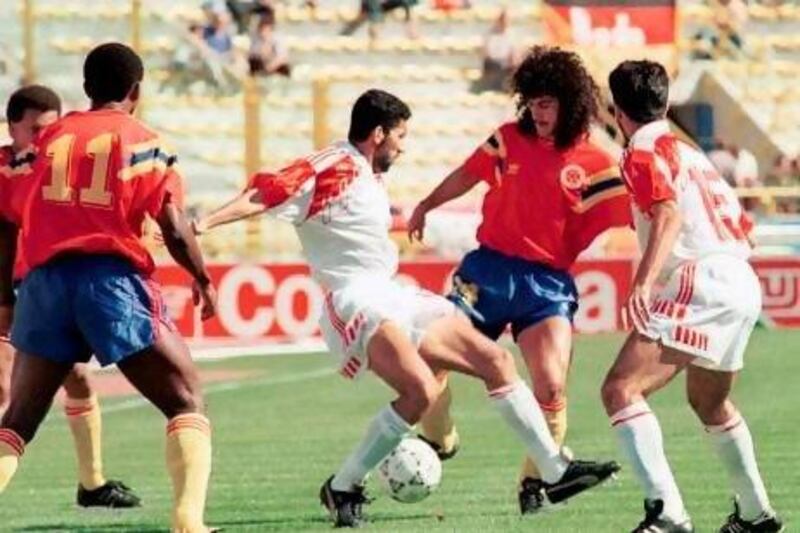 Abdulrahman Mohammed, left, challenges Colombia's Carlos Valderrama in their opening Group D game at the 1990 World Cup. The UAE lost 2-0 and were also defeated by Yugoslavia and West Germany. AFP