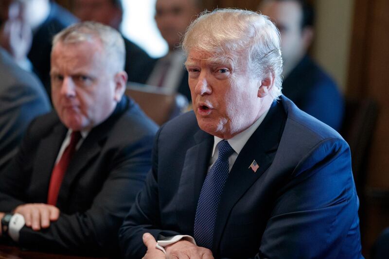 Acting Secretary of State John Sullivan listens as President Donald Trump speaks during a cabinet meeting at the White House, Monday, April 9, 2018, in Washington. (AP Photo/Evan Vucci)