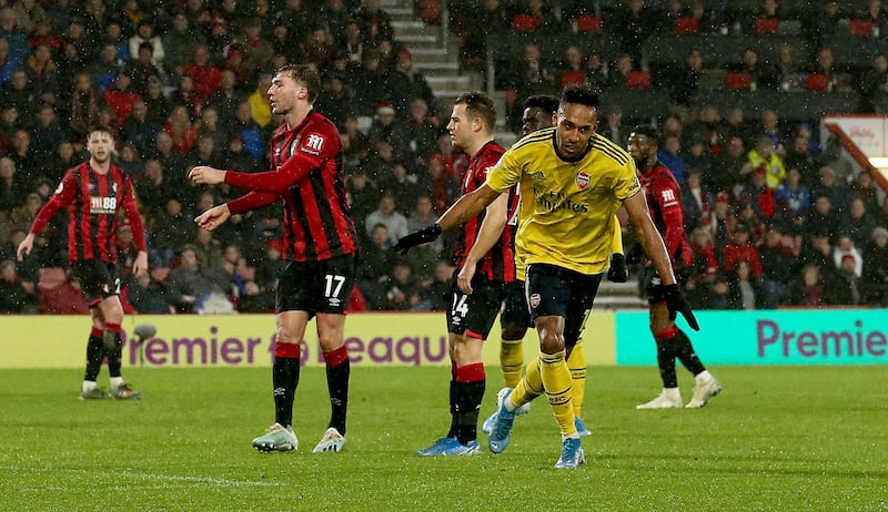 Arsenal's Pierre-Emerick Aubameyang celebrates scoring his side's first goal of the game during the Premier League match at the Vitality Stadium, Bournemouth. PA Photo. Picture date: Thursday December 26, 2019. See PA story SOCCER Bournemouth. Photo credit should read: Mark Kerton/PA Wire. RESTRICTIONS: EDITORIAL USE ONLY No use with unauthorised audio, video, data, fixture lists, club/league logos or "live" services. Online in-match use limited to 120 images, no video emulation. No use in betting, games or single club/league/player publications.
