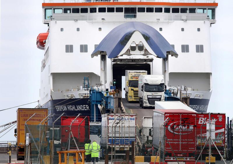 Freight lorries disembark from the the P&O ferry 'European Highlander' after arriving at Larne Port near Belfast, Northern Ireland. AFP