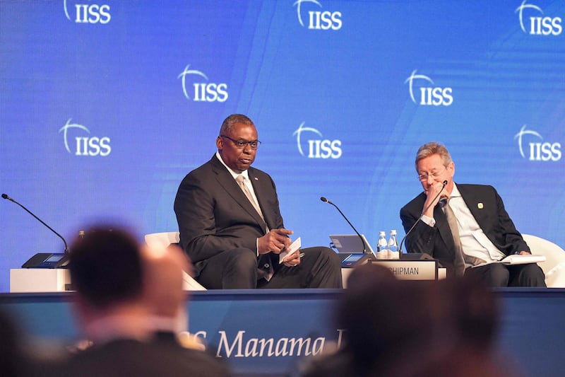 Lloyd Austin, US Secretary of Defence, and John Chipman, director general and chief executive of the International Institute for Strategic Studies, which organised the dialogue.