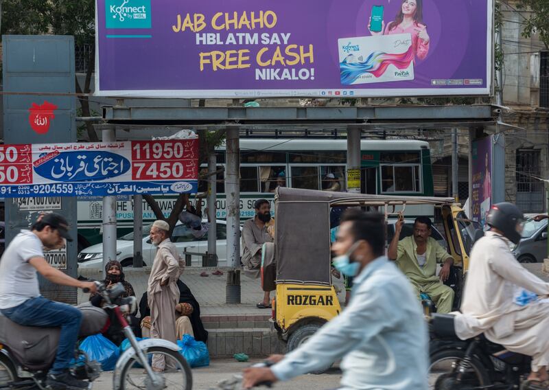 An advertisement for a mobile payment service in Karachi, Pakistan. The government has increased fuel prices as one of the conditions set by the International Monetary Fund to revive its loan programme. Bloomberg