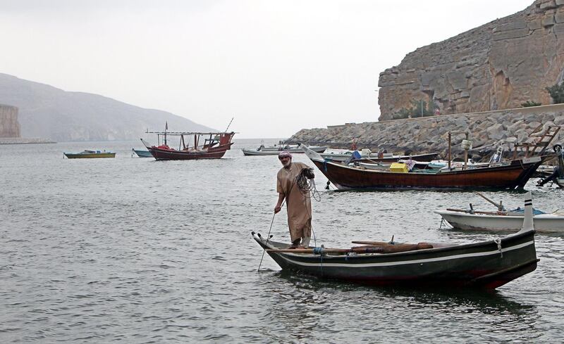 epa03059468 Omani fishermen pull their nets to collect their daily catch from the beaches of Khasab at Strait of Hormuz, Musandam, Oman, 14 January 2012. Iranian generals have recently threatened to close the Strait of Hormuz - a vital international oil shipping route in the Gulf - if oil sanctions are imposed against the Islamic state. The United States issued counter-warnings of decisively confronting such a move.  Reports on 13 January stated the US has warned Iran's supreme leader Ayatollah Ali Khamenei that blocking the strategic Strait of Hormuz was a ?red line? and would provoke a response.  EPA/ALI HAIDER