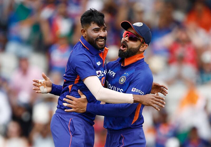 India's Mohammed Siraj and Virat Kohli celebrate the wicket of England opener Jonny Bairstow. Reuters