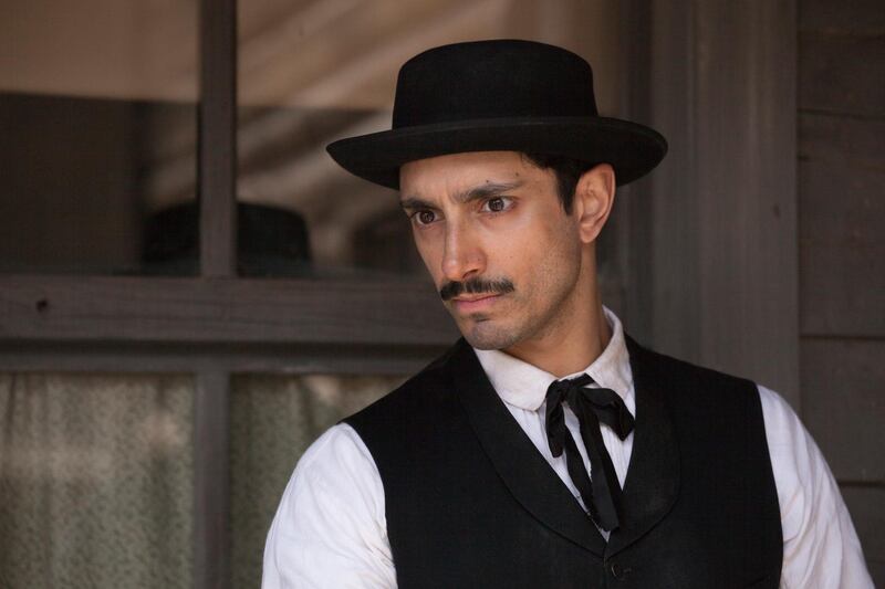 This image released by Annapurna Pictures shows Riz Ahmed in a scene from "The Sisters Brothers." (Magali Bragard/Annapurna Pictures via AP)