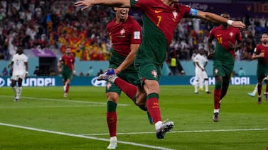 Portugal's Cristiano Ronaldo celebrates after scoring from the penalty spot his side's opening goal against Ghana during a World Cup group H soccer match at the Stadium 974 in Doha, Qatar, Thursday, Nov.  24, 2022.  (AP Photo / Manu Fernandez)