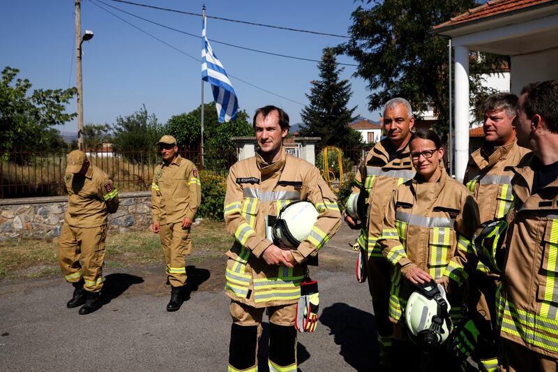 German firefighters, who will reinforce Greek crews this summer following devastating wildfires last year, at a welcoming ceremony in Tripoli, Greece. Reuters