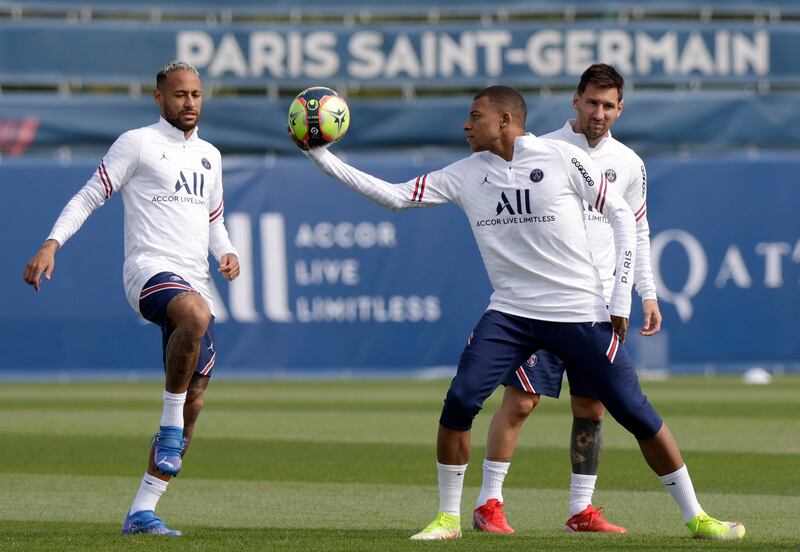 Paris Saint Germain's Kylian Mbappe (C), Lionel Messi (R) and Neymar at training session in Saint-Germain en Laye, near Paris. EPA