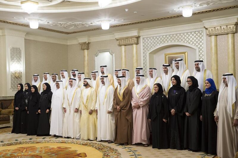 Sheikh Mohammed bin Rashid, Vice-President and Ruler of Dubai, and Sheikh Mohammed bin Zayed, Crown Prince of Abu Dhabi and Deputy Supreme Commander of the Armed Forces, stand for a photograph with the Cabinet ministers during a swearing-in ceremony.
