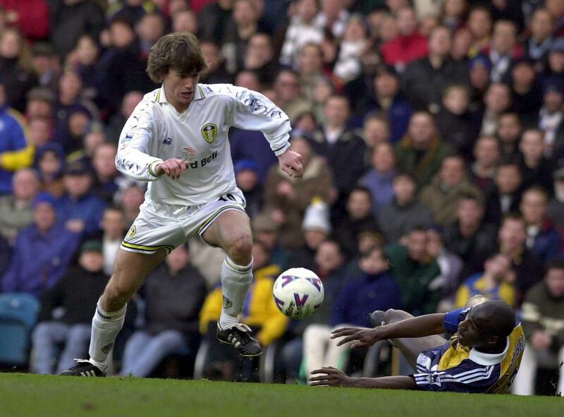 12 Feb 2000:  Harry Kewell of Leeds beats Sol Campbell of Spurs as he scores during the Leeds United v Tottenham Hotspur FA Carling Premiership match at Elland Road, Leeds. Mandatory Credit: Ross Kinnaird/ALLSPORT/Getty Images