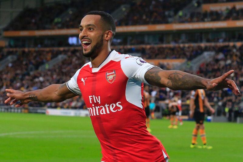 Arsenal’s Theo Walcott celebrates their second goal against Hull City. Lindsey Parnaby / AFP