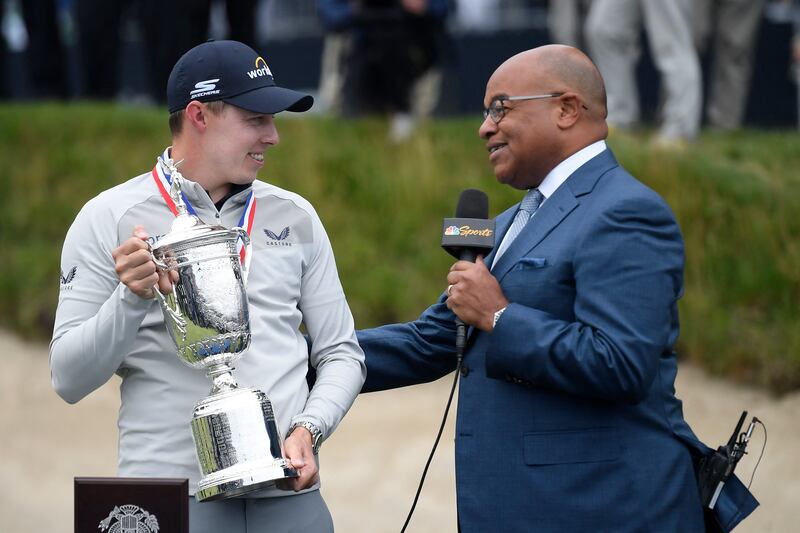 Matt Fitzpatrick talks to commentator Mike Tirico after winning the US Open. Reuters