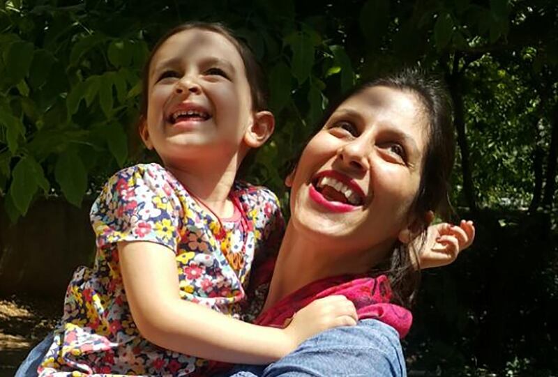 (FILES) In this file handout photo taken on August 23, 2018 and released by the Free Nazanin campaign on August 23, 2018, Nazanin Zaghari-Ratcliffe (R) embraces her daughter Gabriella in Damavand, Iran following her release from prison for three days. - Nazanin Zaghari-Ratcliffe, the British-Iranian woman who has been held in Tehran for more than two years on sedition charges, returned to prison on August 26, 2018, after temporary release, dashing her family's hopes of an extension. (Photo by - / Free Nazanin campaign / AFP) / RESTRICTED TO EDITORIAL USE - MANDATORY CREDIT "AFP PHOTO / FREE NAZANIN CAMPAIGN" - NO MARKETING NO ADVERTISING CAMPAIGNS - DISTRIBUTED AS A SERVICE TO CLIENTS - NO ARCHIVE