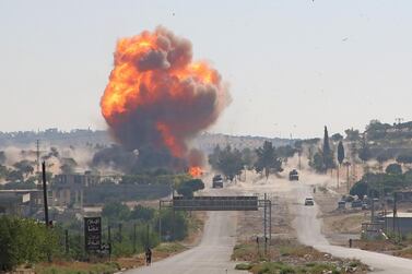 A fireball erupts from an explosion that struck a joint Turkish-Russian patrol on the strategic M4 highway in Syria's Idlib province on July 14, 2020. AFP