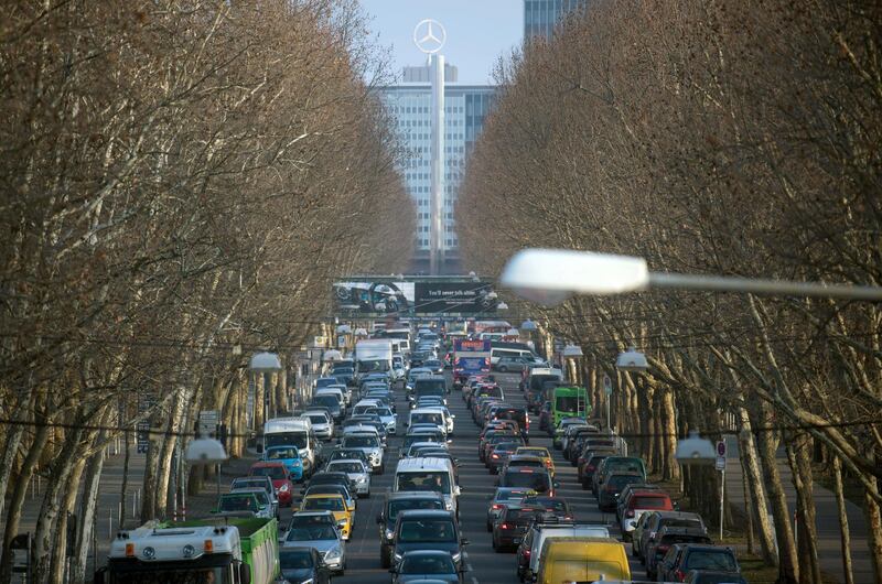 In this Feb. 21, 2018 photo cars jam in Stuttgart, southern Germany. A German court began considering Thursday, Feb. 22, 2018  whether authorities should ban diesel cars from cities to lower air pollution, a move that could have drastic consequences for the country's powerful auto industry. (Marijan Murat/dpa via AP)