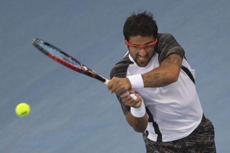 Janko Tipsarevic struggled with the wind towards the latter part of his match.