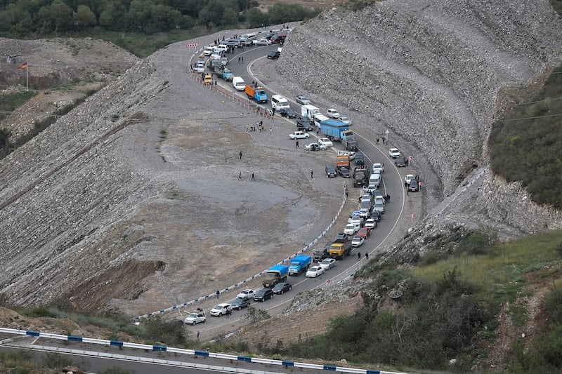 Ethnic Armenians flee Nagorno-Karabakh to Kornidzor, in Armenia's Syunik region. AP