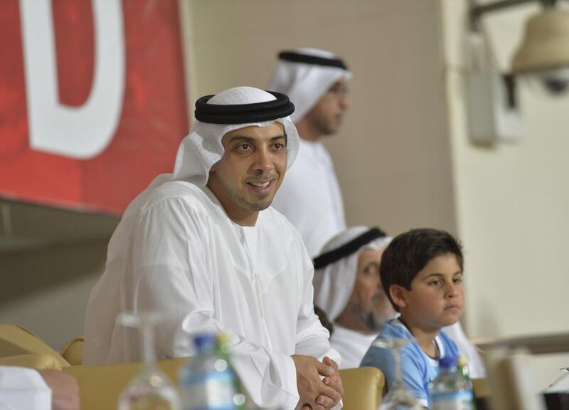 Sheikh Mansour, with his son Sheikh Mohammed bin Mansour at the Al Jazira stadium.
