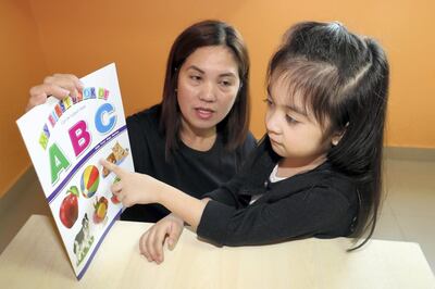 Fujairah, United Arab Emirates - April 5th, 2018: Welma De Leon a 47-year old Filipino mother and her autistic 5-year-old daughter Elijah, at the Dimensions Centre which helps kids with special needs. Thursday, April 5th, 2018 at Dimensions Centre, Fujairah. Chris Whiteoak / The National
