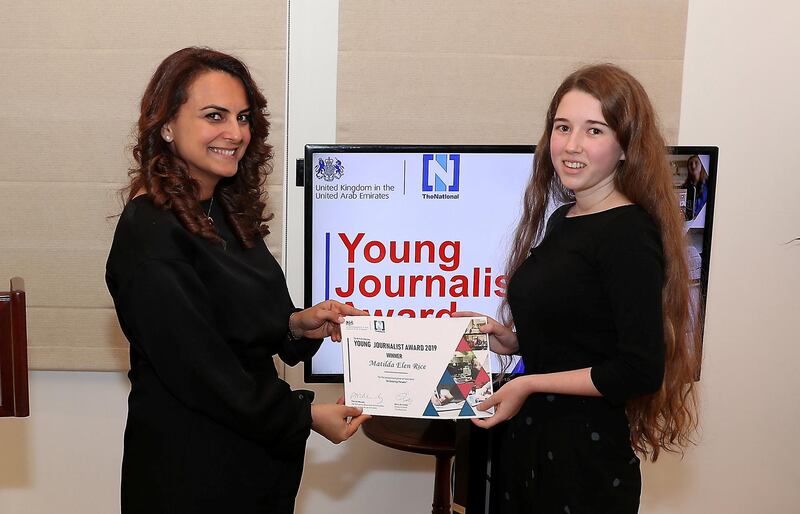 ABU DHABI , UNITED ARAB EMIRATES , Nov 18 – 2019 :- Mina Al Oraibi , Editor in Chief, The National giving certificate to Matilda Elen Rice, 1st  winner of British Embassy Young Journalist Award 2019 during the award giving ceremony held at the residence of British Ambassador on Saadiyat Island in Abu Dhabi. ( Pawan Singh / The National )  For News. Story by Nick March