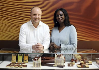 Dubai, United Arab Emirates - June 24, 2019: General manager Martin van Almsick and his wife Hanan Ahmed Saad, Customer Relationship Manager. A tour round Al Nassma chocolate factory the first company to produce camel milk chocolate. Monday the 24th of June 2019. Silicone Oasis, Dubai. Chris Whiteoak / The National