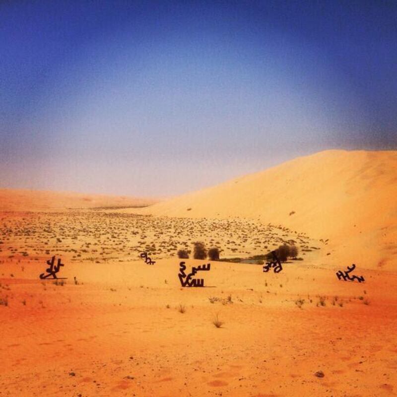 Erin Meekhof’s Abjad sculptures in the Liwa desert near Qasr Al Serab hotel (Photo by Meagan Kelly Horsman)