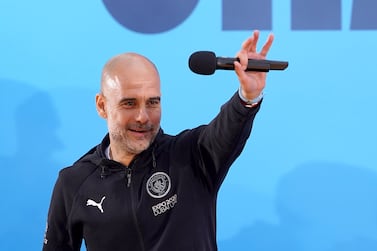 Manchester City manager Pep Guardiola on stage during the Premier League trophy parade in Manchester. Picture date: Monday May 23, 2022.