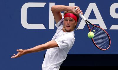 epa08637940 Alexander Zverev of Germany hits a reutrn to Kevin Anderson of South Africa during their match on the first day of the US Open Tennis Championships the USTA National Tennis Center in Flushing Meadows, New York, USA, 31 August 2020. Due to the coronavirus pandemic, the US Open is being played without fans and runs from 31 August through 13 September.  EPA/JASON SZENES