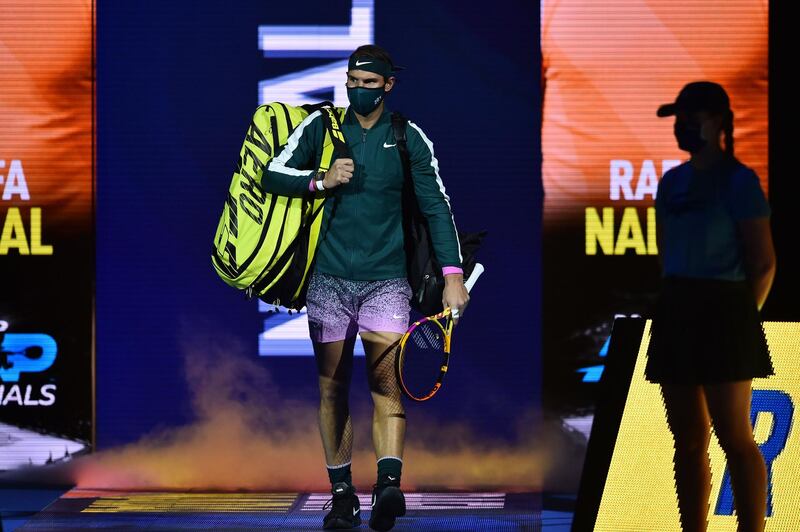 Spain's Rafael Nadal arrives on court to play Austria's Dominic Thiem in their men's singles round-robin match on day three of the ATP World Tour Finals tennis tournament at the O2 Arena in London. AFP