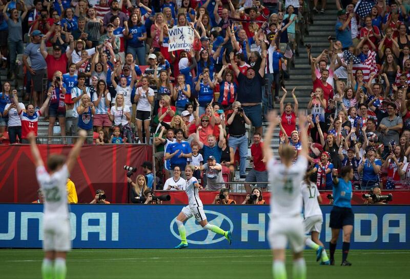 United States striker Abby Wambach, centre, celebrates her goal against Nigeria during the first half of their match at the Fifa Women's World Cup in Vancouver, British Columbia, on June 16, 2015. Darryl Dyck / The Canadian Press via AP