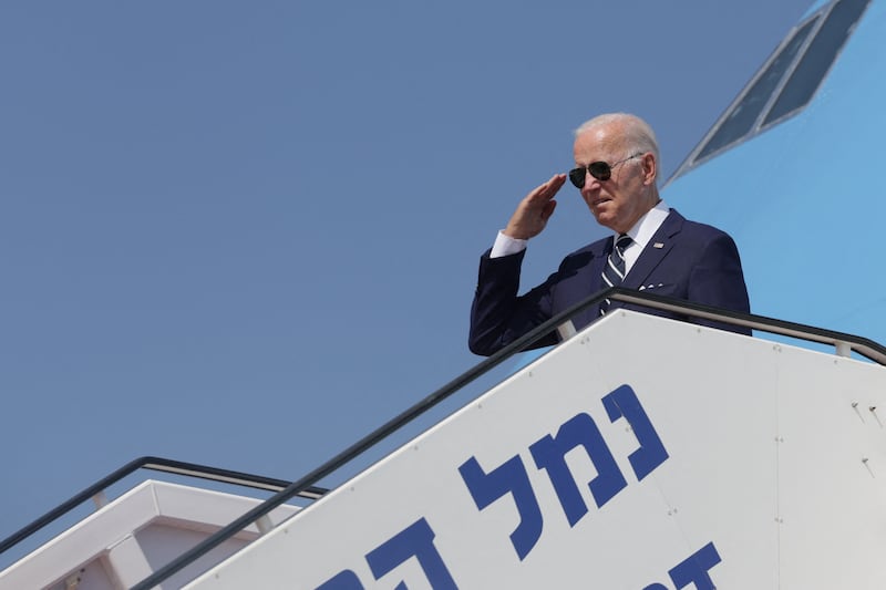 US Presidents Joe Biden salutes as he boards Air Force One at Ben Gurion International Airport in Lod, near Tel Aviv en route to a meeting with the GCC+3 in Jeddah, Saudi Arabia. Reuters