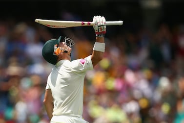 David Warner of Australia celebrates on Tuesday during his first-day century in the fourth Test against India in Sydney. Cameron Spencer / Getty Images / January 6, 2015 