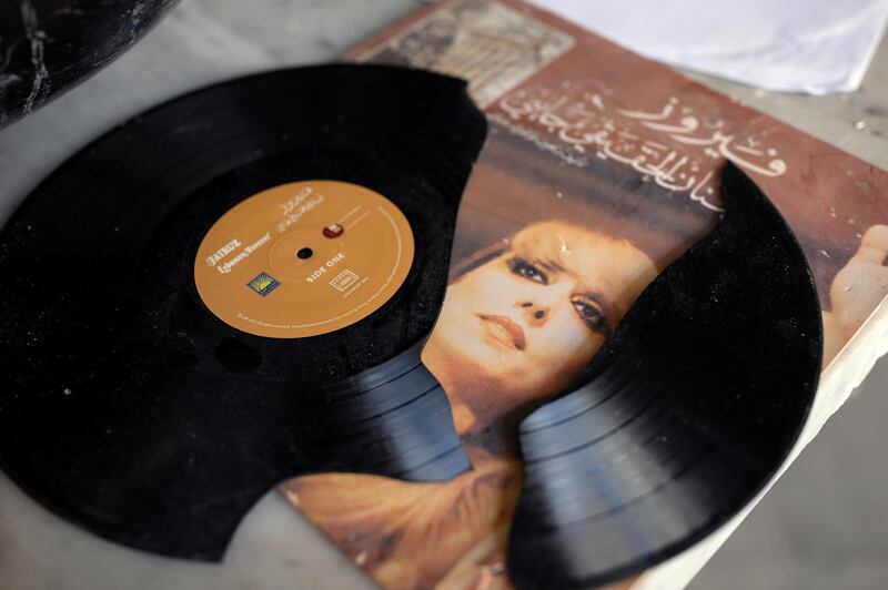 A broken record of Lebanese singer Fayrouz lies among the debris at Saab's home.