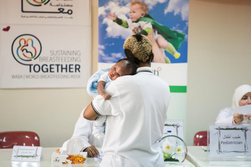 DUBAI, UNITED ARAB EMIRATES - AUG 1: 

DUBAI, UNITED ARAB EMIRATES - AUG 1: 

Susan Masha, hold her 1 month daughter, Delight.

Today, Al Baraha Hospital celebrates World Breastfeeding Week 2017 under the slogan “Sustaining breastfeeding together".

(Photo by Reem Mohammed/The National)

Reporter: RUBA HAZA
Section: NA

(Photo by Reem Mohammed/The National)

Reporter: RUBA HAZA
Section: NA