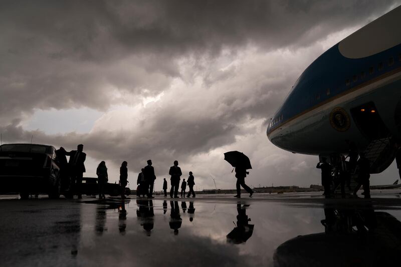 US President Donald Trump walks to his vehicle after arriving at Fort Lauderdale for a fundraiser. AP Photo