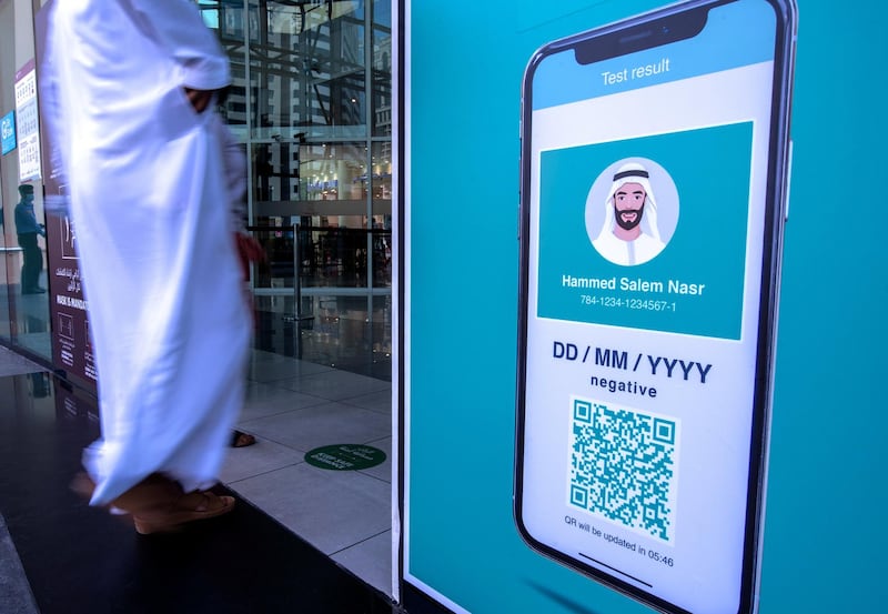 Al Hosn Green Pass awareness signages are put up at the Al Wahda Mall, Abu Dhabi on June 14th, 2021. The new Covid-19 restrictions start tomorrow. Victor Besa / The National.