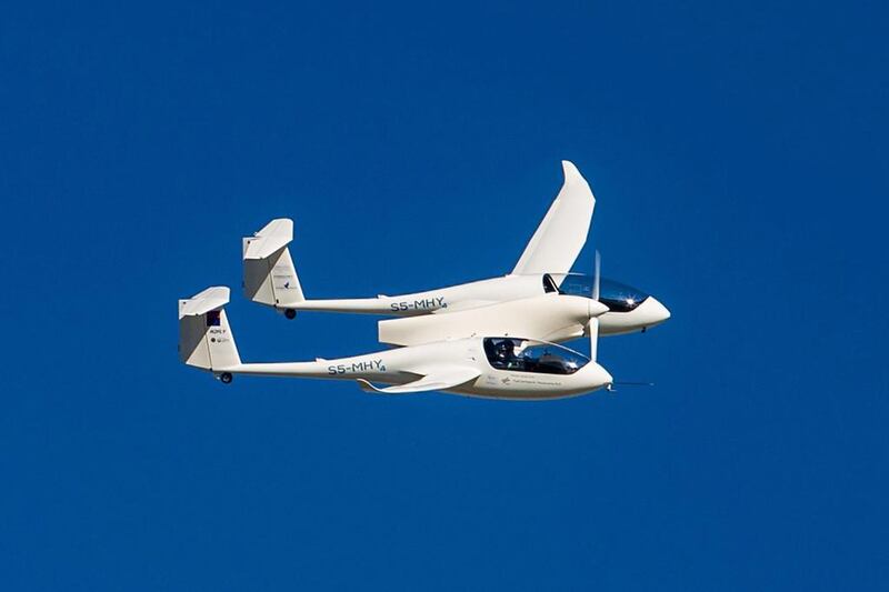 HY4 flies in clear skies during its world premiere above the airport. Christoph Schmidt / EPA