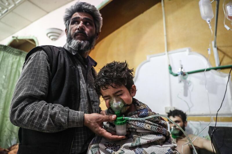 epa06565553 An affected child receives treatment after a gas attack on al-Shifunieh village, in Eastern Ghouta, Syria, 25 February 2018 (issued 26 February 2018). According to activists working in the area, more than 18 people were affected by poisenous gas, and one child was killed, during an attack on the village of al-Shifunieh. Government forces loyal to President Bashar al-Assad are currently conducting an air and ground offensive in Eastern Ghouta. The offensive was initiated soon after the United Nations passed a resolution calling for a 30-day cessation of hostilities in Syria.  EPA/MOHAMMED BADRA