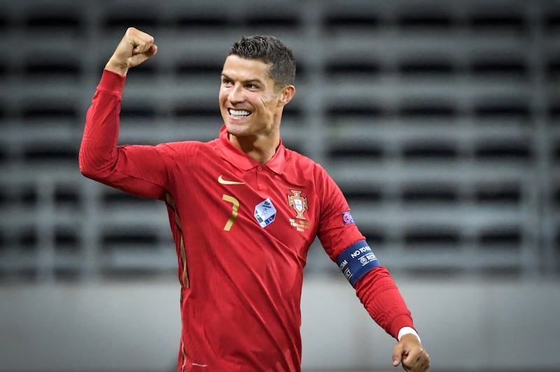 Cristiano Ronaldo celebrates after scoring his 100th goal for Portugal during the Uefa Nations League match against Sweden in Solna on September 8, 2020. AFP