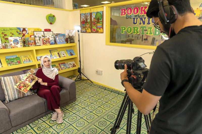 DUBAI, UNITED ARAB EMIRATES. 10 MARCH 2020. Chubby Cheeks Nurseryare producing educational videos and tutorials for one to four-year-old children currently at  home to learn skills such as cooking without fire, home safety to stranger danger videos sent by a nursery. Teacher Shorooq Sharaf teachng Arabic reading. (Photo: Antonie Robertson/The National) Journalist: Ramola Talwar. Section: National. 
