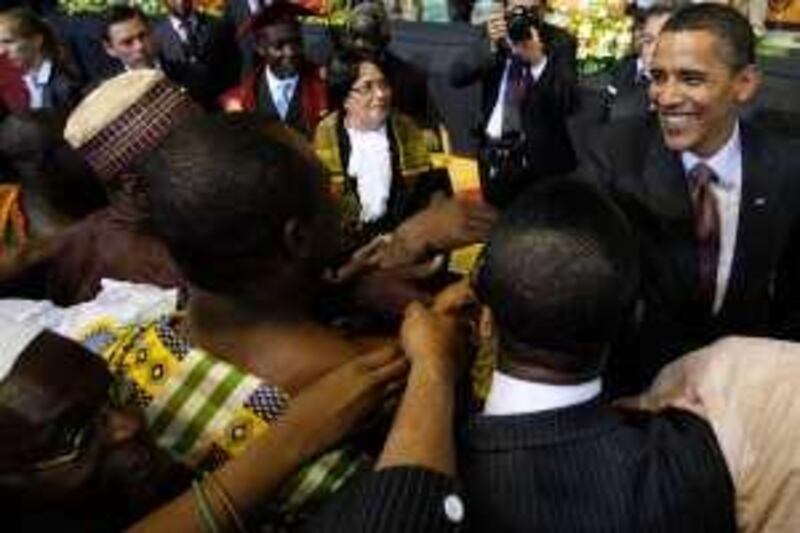 U.S. President Barack Obama greets members of the Ghanaian Parliament at the Accra International Conference Center July 11, 2009.  REUTERS/Jim Young (GHANA POLITICS) *** Local Caption ***  WHT812_OBAMA-AFRICA_0711_11.JPG