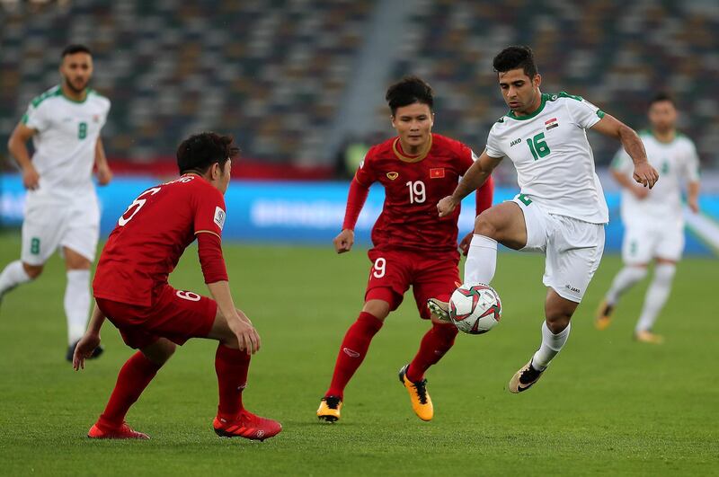 ABU DHABI , UNITED ARAB EMIRATES , January 8 – 2019 :- Hussein Al Saedi ( no 16 in white ) of Iraq in action during the AFC Asian Cup UAE 2019 football match between IRAQ vs. VIETNAM held at Zayed Sports City in Abu Dhabi. Iraq won the match by 3-2. ( Pawan Singh / The National ) For News/Sports
