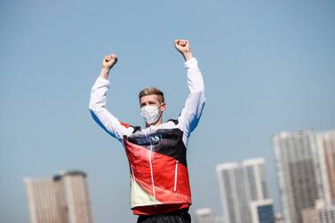 05 August 2021, Japan, Tokio: Swimming: Olympics, Open Water - 10km, Men at Odaiba Marine Park. Florian Wellbrock from Germany jubilant about gold medal at the award ceremony. Photo: Oliver Weiken / dpa (Photo by Oliver Weiken / picture alliance via Getty Images)