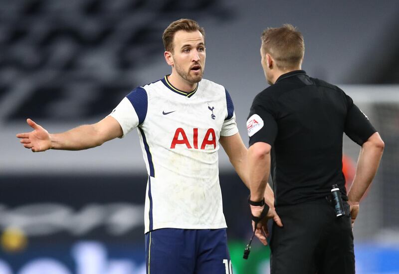 Tottenham Hotspur's Harry Kane speaks with referee Craig Pawson Pool. reuters