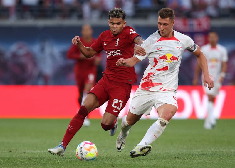 Liverpool's Luis Diazunder pressure from Willi Orban of RB Leipzig. AFP